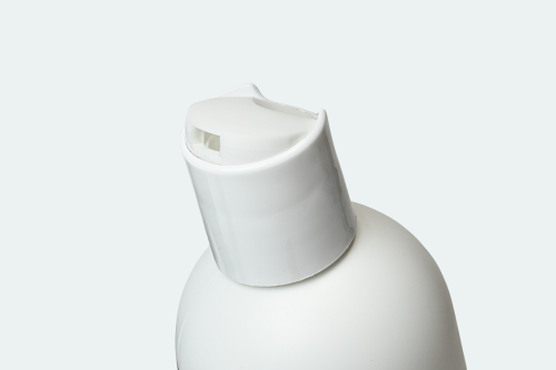 E disc top closure on light gray background